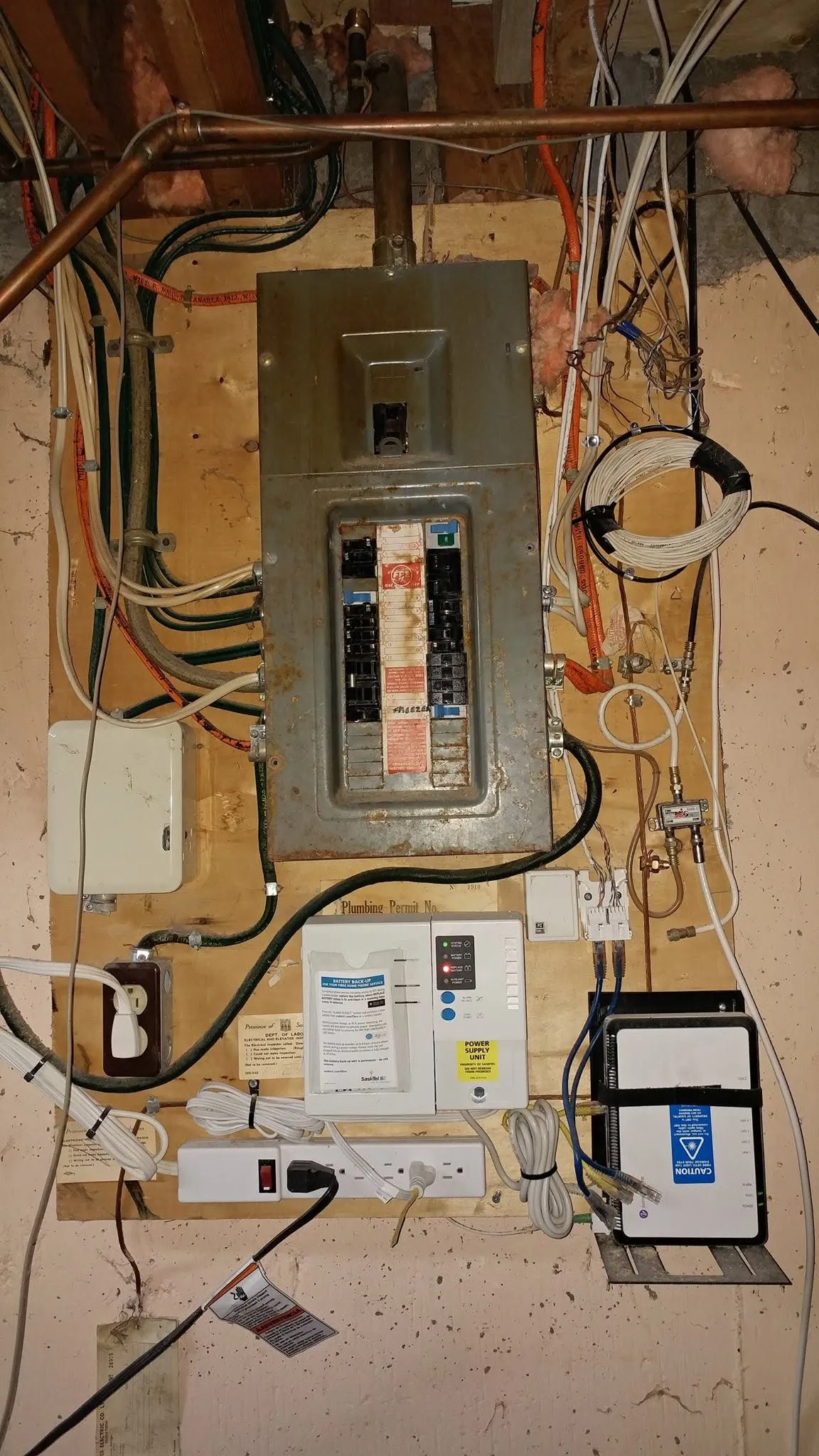 New residential electrical panel with neat wiring in a basement