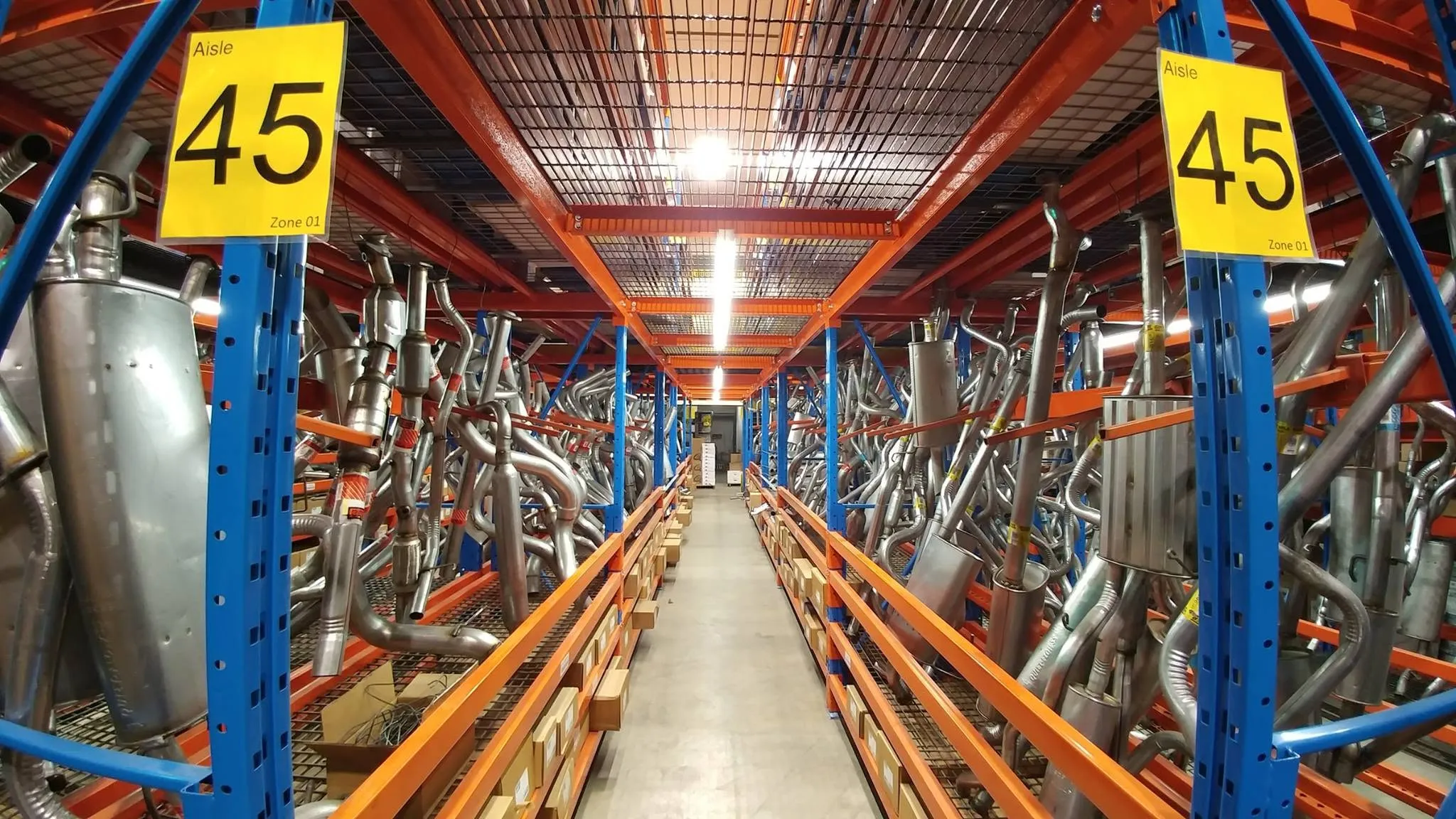 Warehouse aisle with new lighting installed by CL Electric